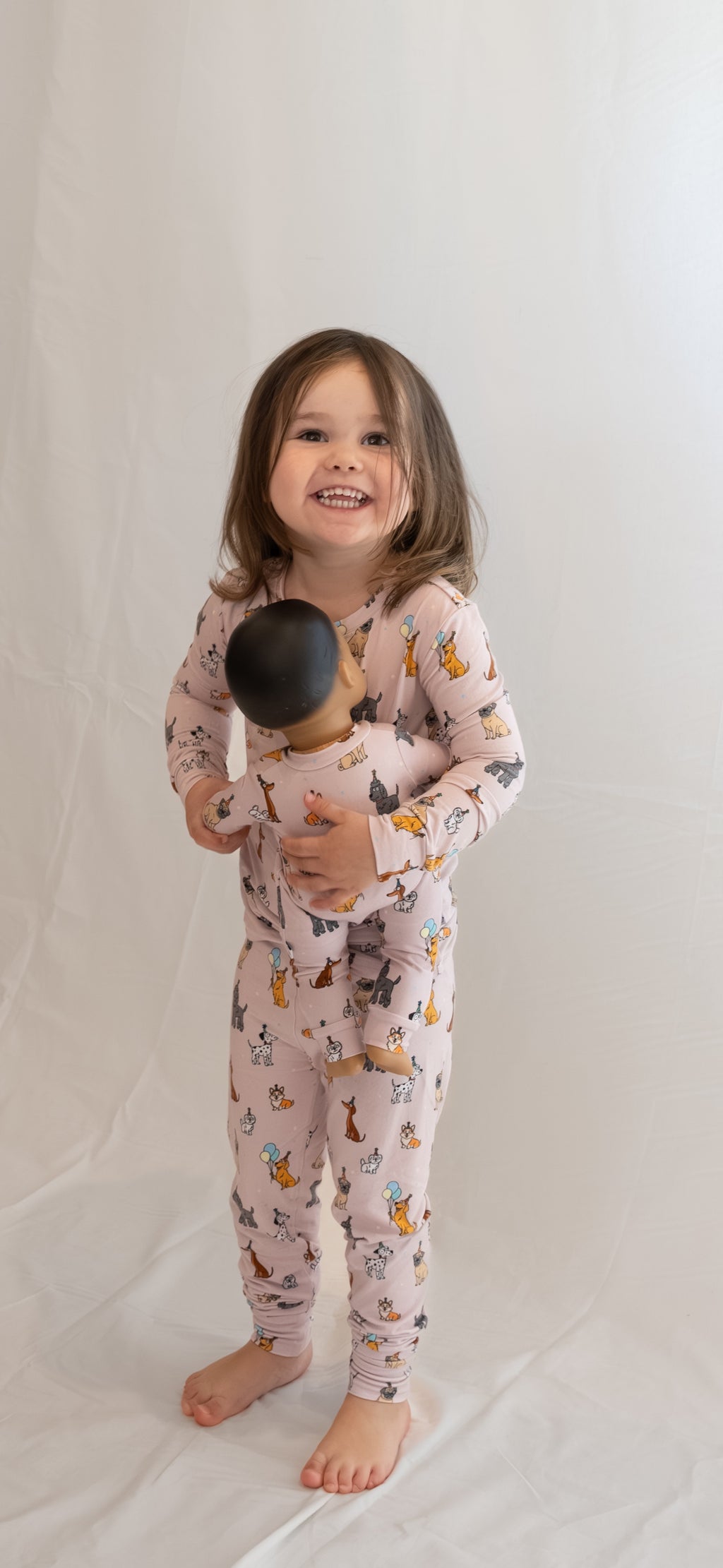 Pink bamboo two-piece pajamas for toddlers and kids dog puppy print