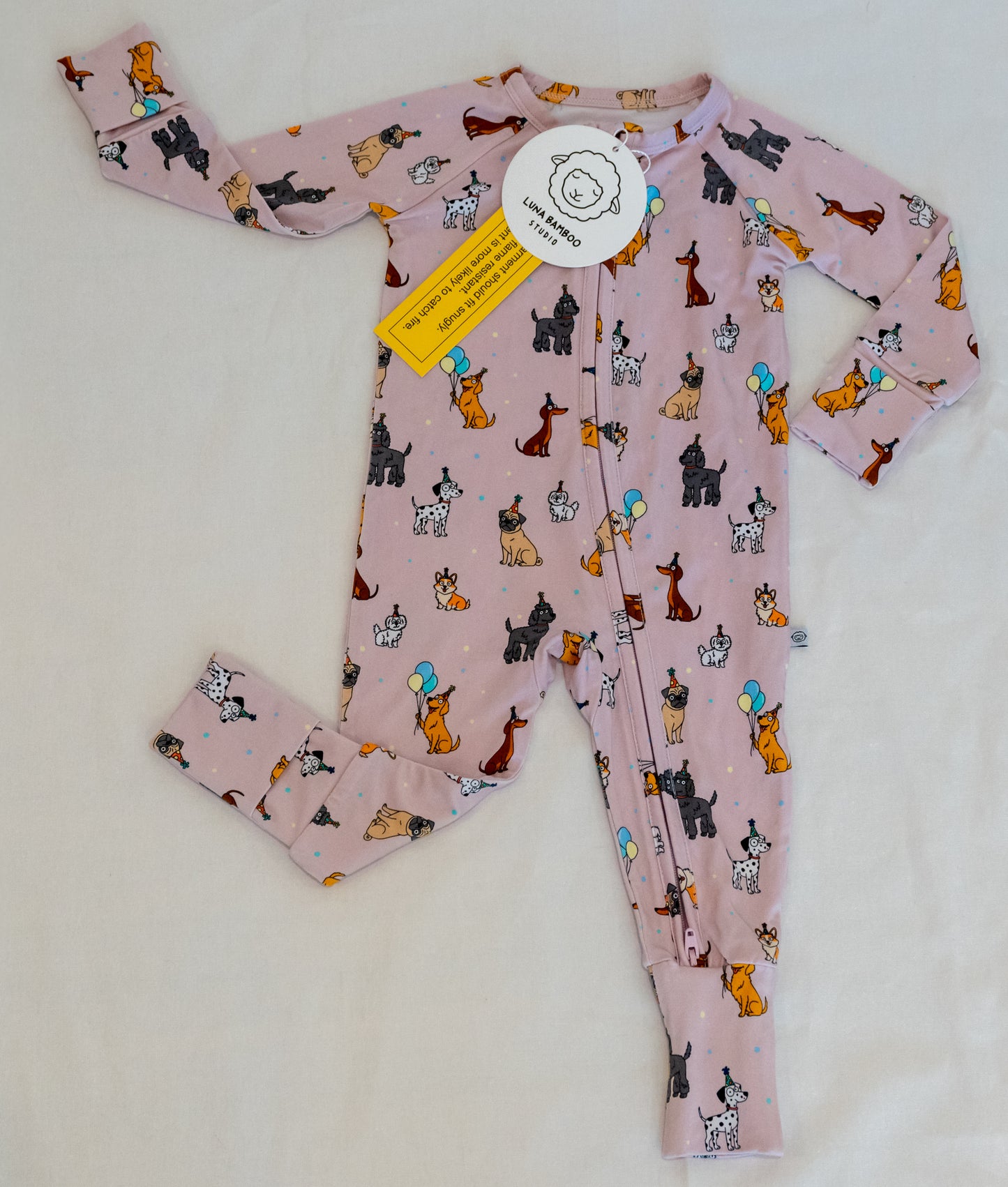 Pink bamboo zip sleeper with puppy print for babies & toddlers