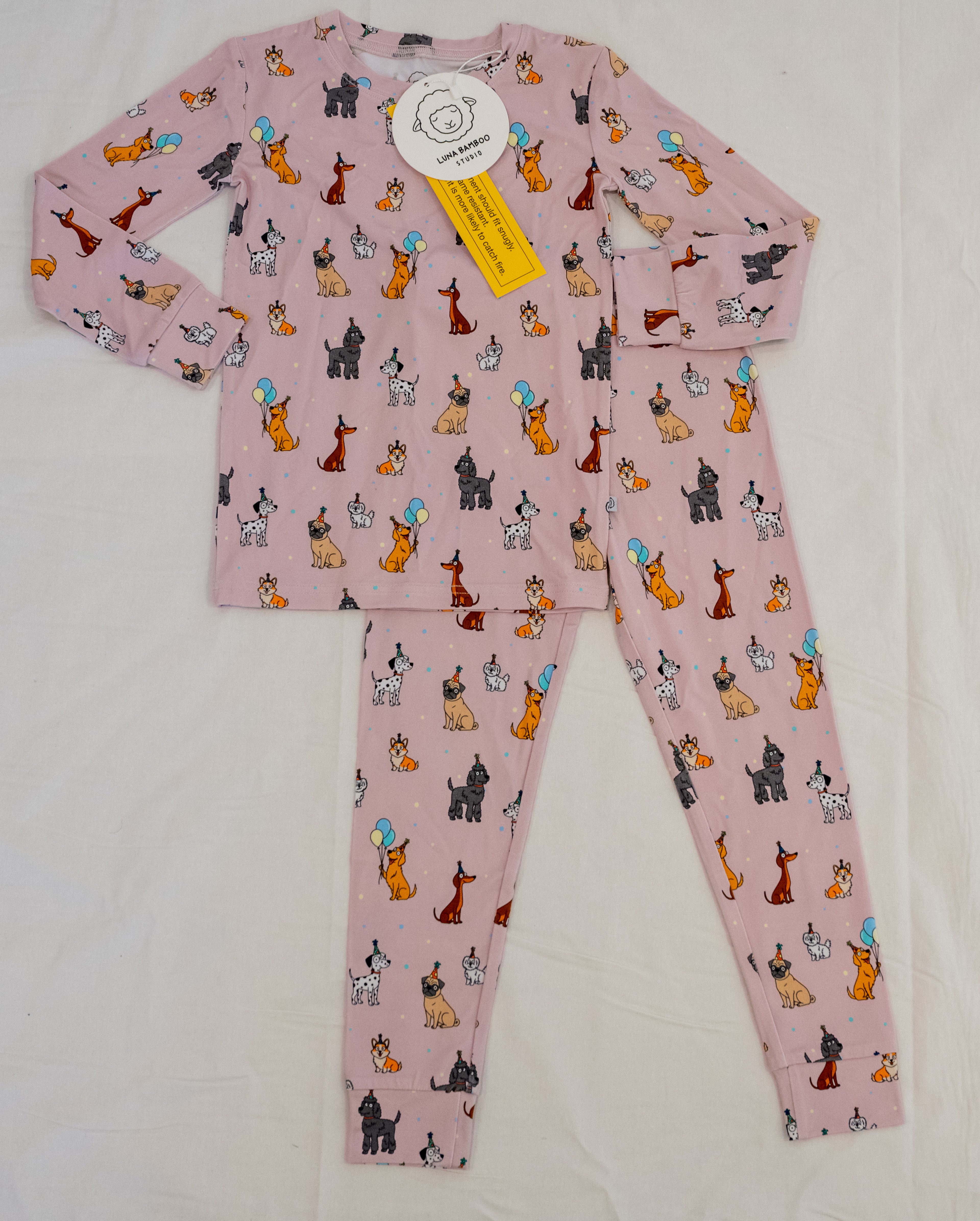 Pink bamboo two-piece pajamas for toddlers and kids dog puppy print