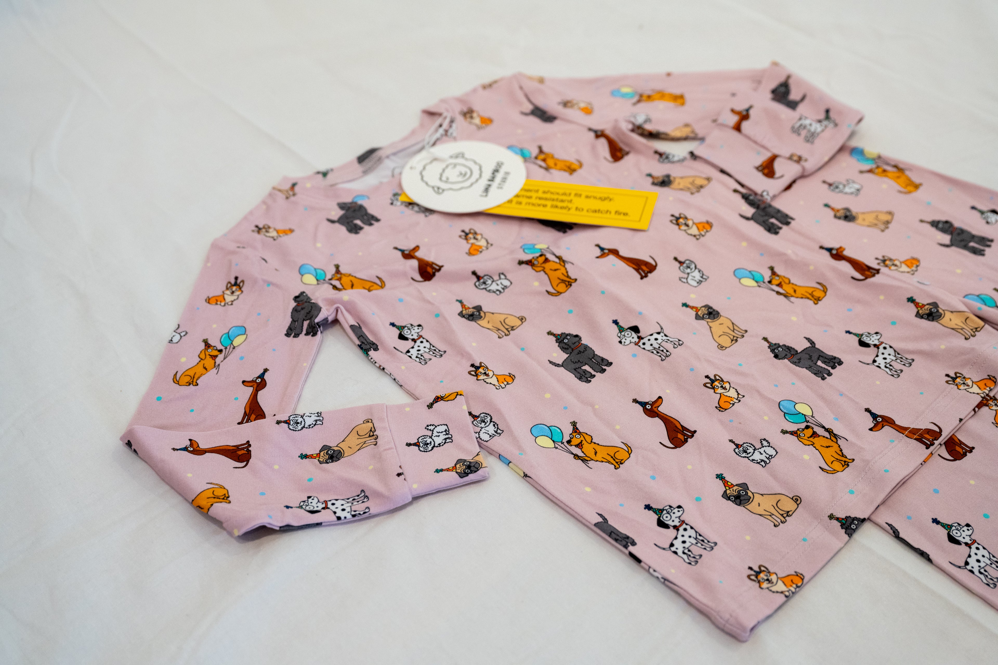 Pink bamboo two-piece pajamas for toddlers and kids dog puppy print