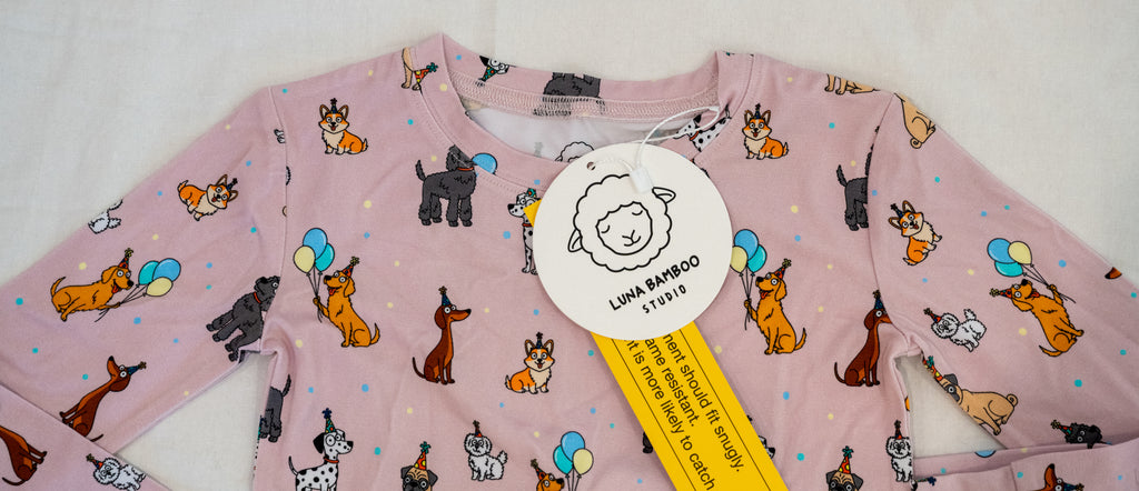 Pink bamboo two-piece pajamas for toddlers and kids dog print