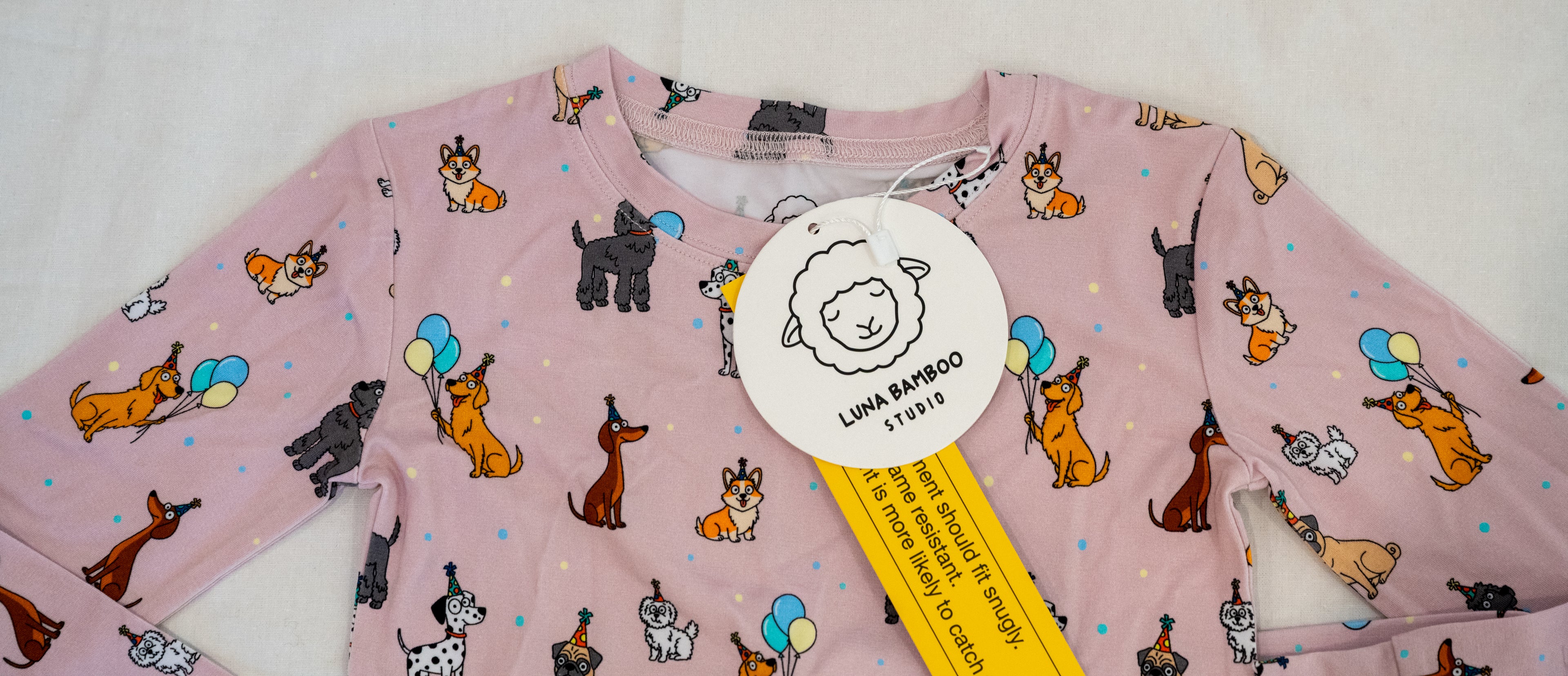 Pink bamboo two-piece pajamas for toddlers and kids dog print