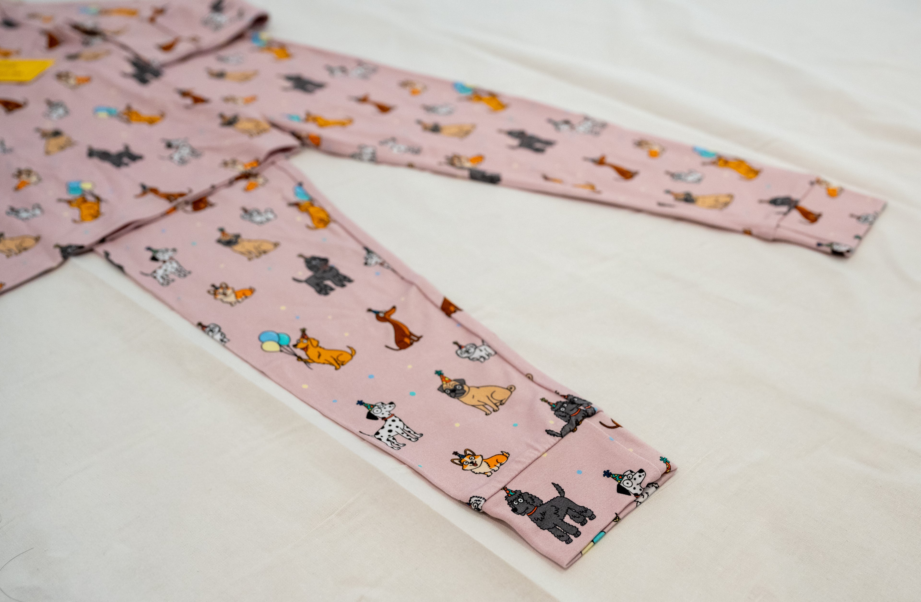 Pink bamboo two-piece pajamas for toddlers and kids dog puppy print