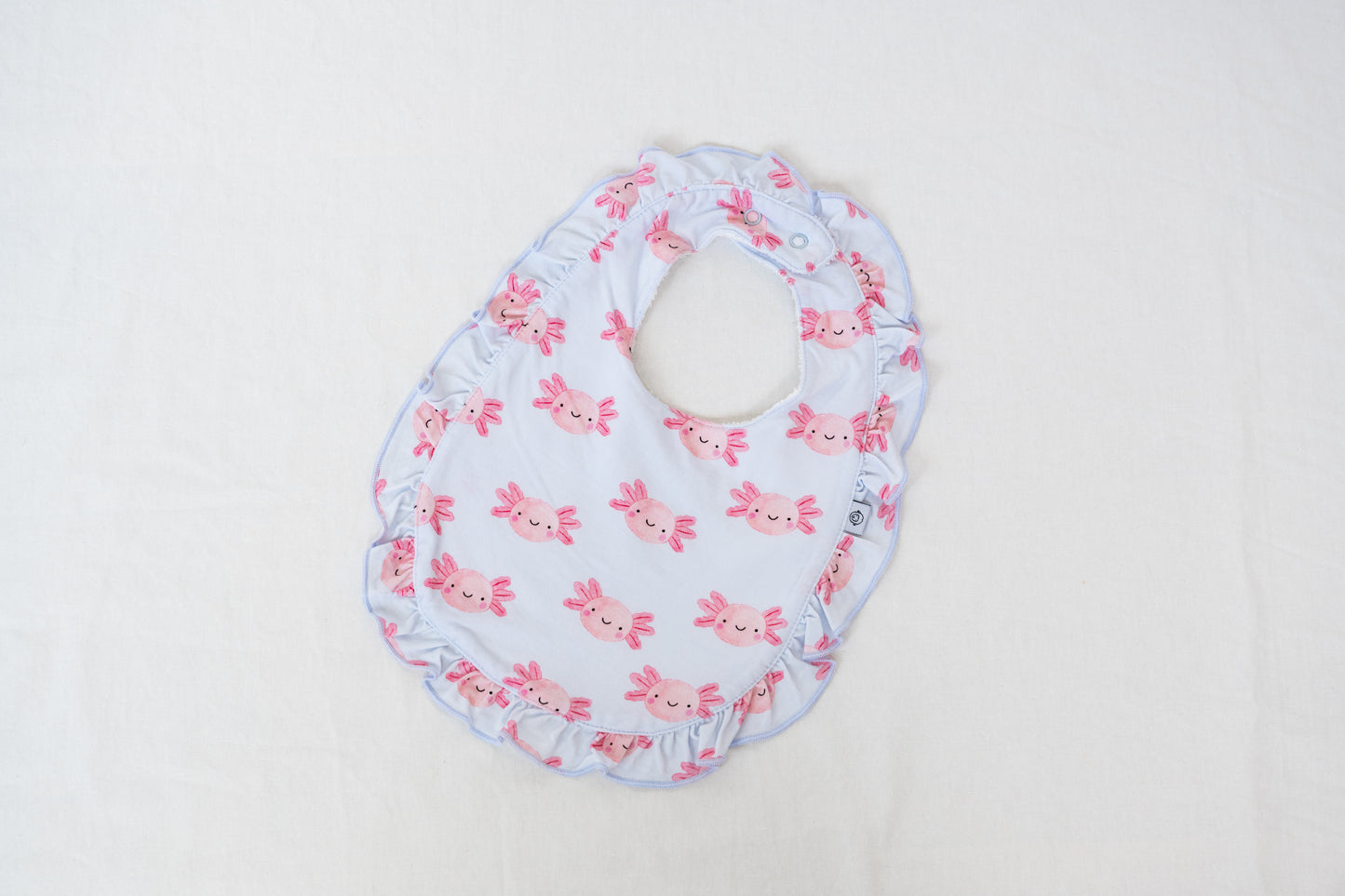 Lyocell Ruffle Bib | Sally Mander Axolotl