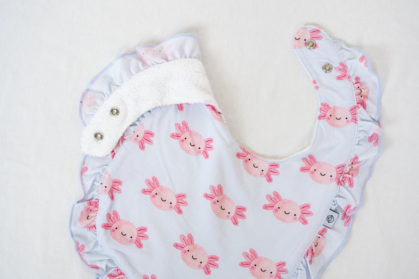 Lyocell Ruffle Bib | Sally Mander Axolotl